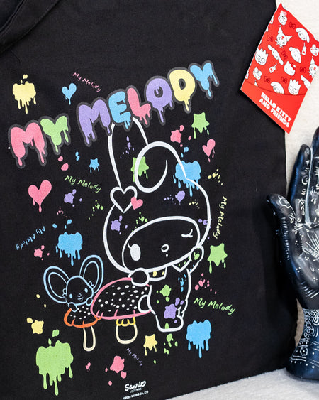 my melody Sanrio official tote bag in black with a cute white outline of My Melody with coloured paint splatters