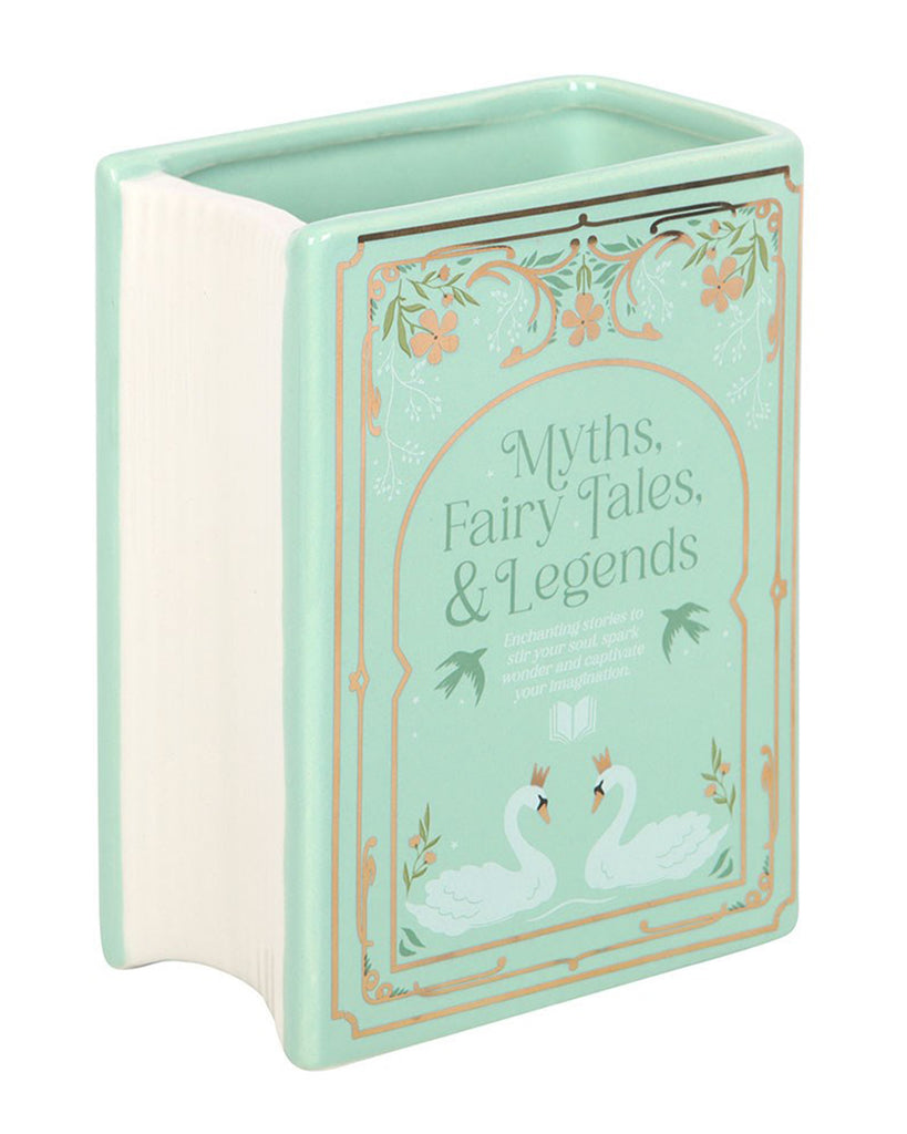 Side view of the Rebel Romance Myths, Fairy Tales & Legends Green Book Shaped Vase. A mint green ceramic vase with decorative swans and gold accents, shaped like an upright book. Perfect for holding flowers or as a statement piece in any literary-inspired home.