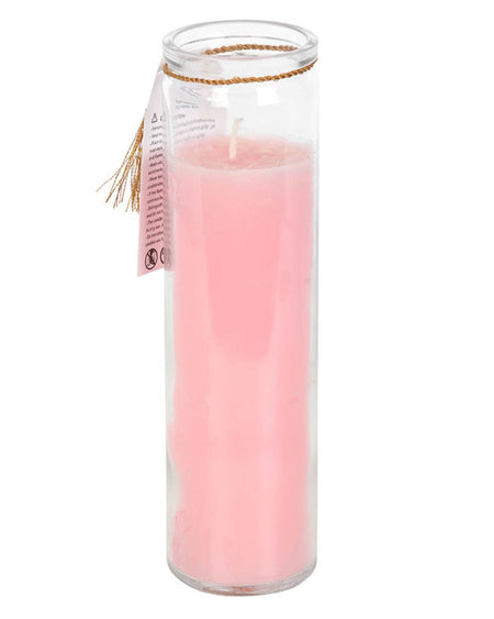 A tall, pink Mystic Rose Quartz Crystal tube candle with a gold tassel and an affirmation tag reading ‘Let your inner light shine,’ standing against a white background.