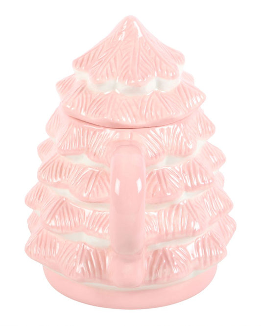 Back view of the Rebel Romance Pink Christmas Tree Mug showcasing the handle and textured tree layers in pastel pink. The ceramic glaze catches the light, highlighting the festive details.