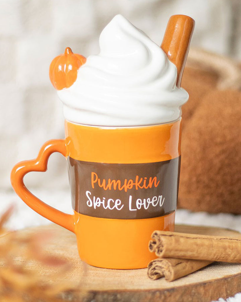 Cosy autumnal scene with the Rebel Romance Pumpkin Spice Lover Mug surrounded by cinnamon sticks and soft textures. Ideal for autumn décor, gifting or sipping hot drinks in style.