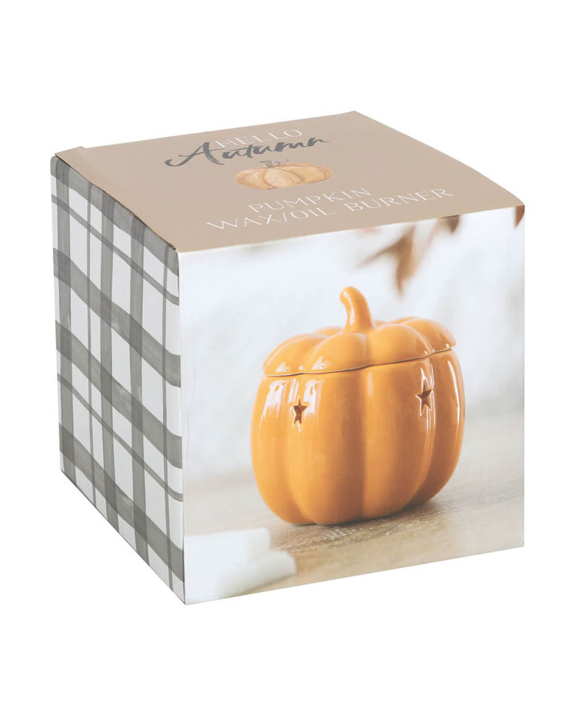 The pumpkin oil burner in its autumn-themed packaging with a photo of the burner on the front.