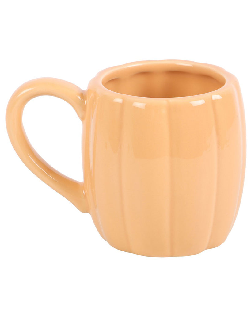Side view of the plain pumpkin-shaped mug without the face design, showcasing the ridged ceramic shape and curved handle.