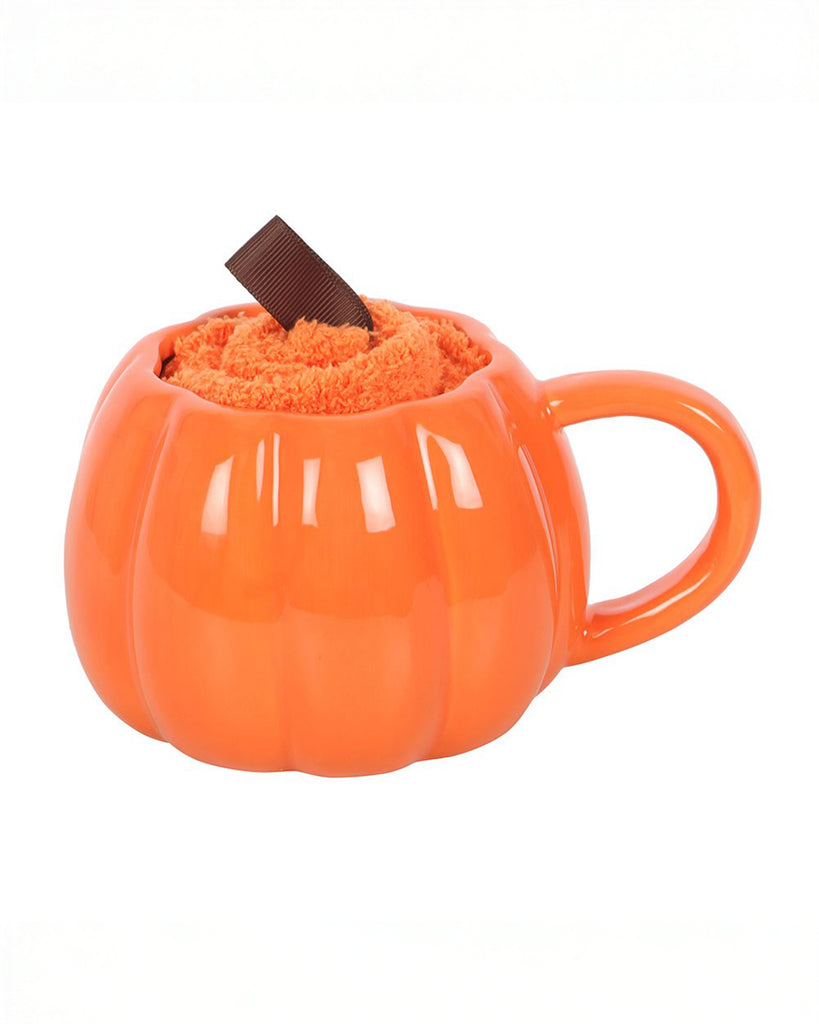 Back view of Rebel Romance pumpkin mug gift set with orange socks tucked inside the ceramic mug. Designed to resemble a cheerful pumpkin, this seasonal set is ideal for Halloween or autumn gifting.