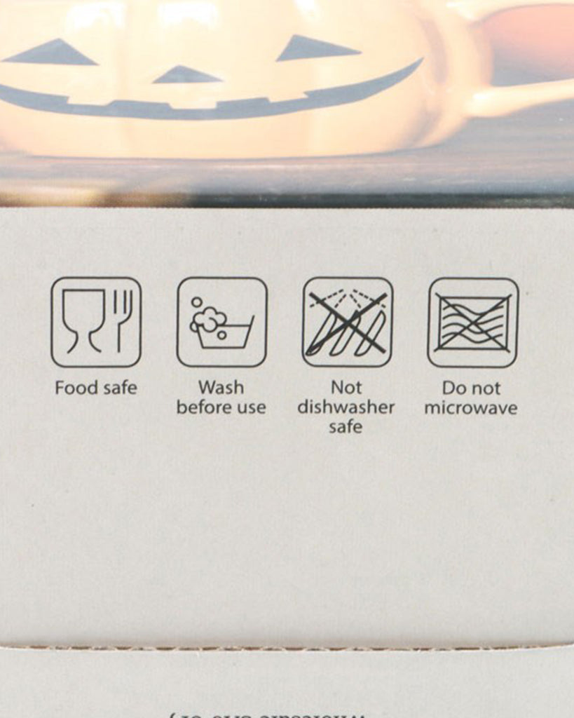 Product packaging symbols showing the pumpkin mug is food safe, hand wash only, not dishwasher or microwave safe.