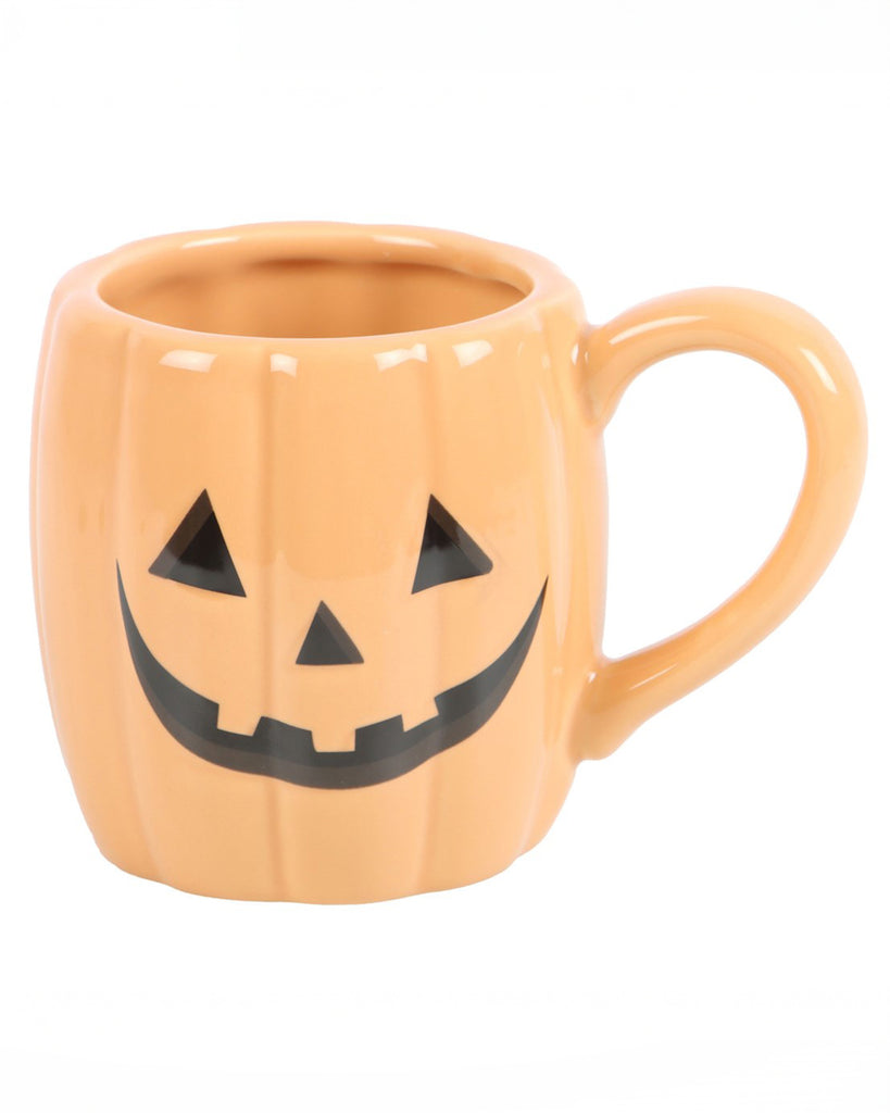 Front-facing image of the Jack-o'-Lantern Pumpkin Mug with a wide carved-style smile and triangle eyes, in a classic orange ceramic finish.