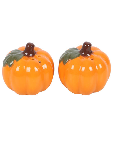 Front view of Rebel Romance’s ceramic pumpkin salt and pepper shakers, styled as adorable pumpkins with leafy detail and shaker holes on top. Great for adding a cosy autumnal feel to your home or Halloween party.