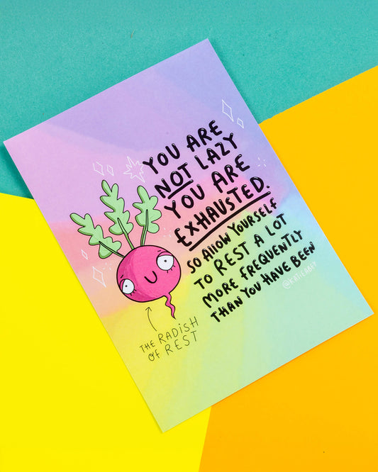 A colourful A6 postcard featuring a smiling pink radish with leafy green top and the message “You are not lazy, you are exhausted. So allow yourself to rest a lot more frequently than you have been.” Designed by Katie Abey and sold by Rebel Romance, this postcard promotes rest and self-compassion, printed on high-quality silk finish card.