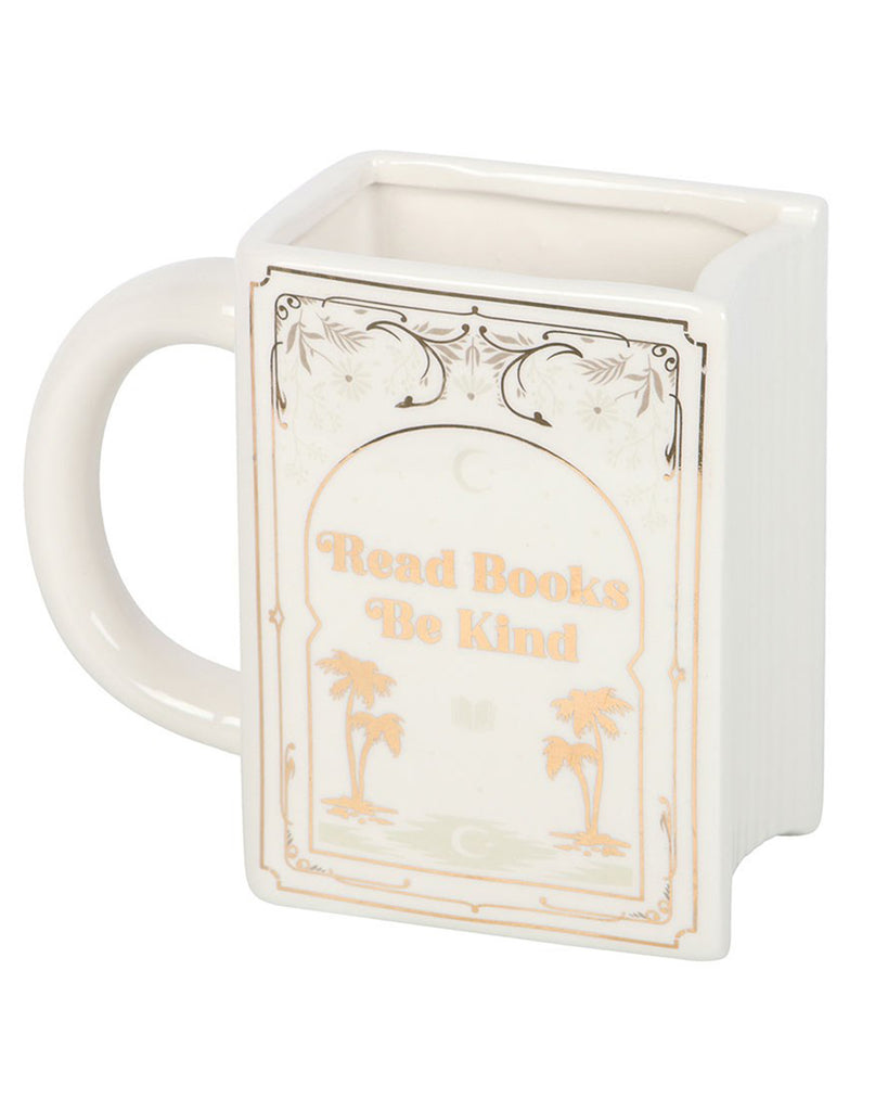 Side angle of the Rebel Romance white ceramic Read Books Be Kind mug, shaped like a book with a vintage-style gold printed design. A unique alternative homeware piece for readers and kindness advocates.