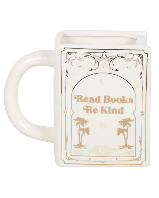 Front view of the Rebel Romance Read Books Be Kind ceramic book-shaped mug. The design features golden lettering and delicate decorative details, making it an ideal gift for readers who love cosy evenings with tea and a good novel.