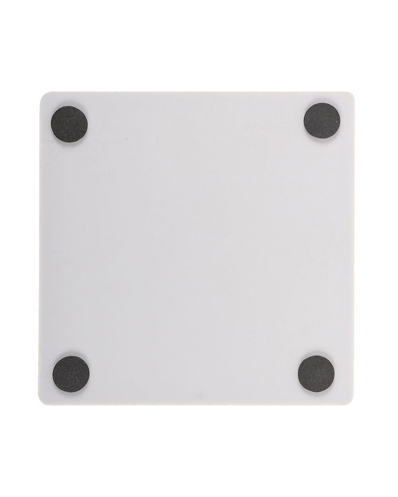 Back view of the Steven Rhodes Let’s Sacrifice Toby Coaster sold by Rebel Romance. The coaster is square with rounded edges, featuring four protective black grips to prevent slipping on your coffee table or altar.