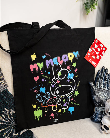 my melody Sanrio official tote bag in black with a cute white outline of My Melody with coloured paint splatters