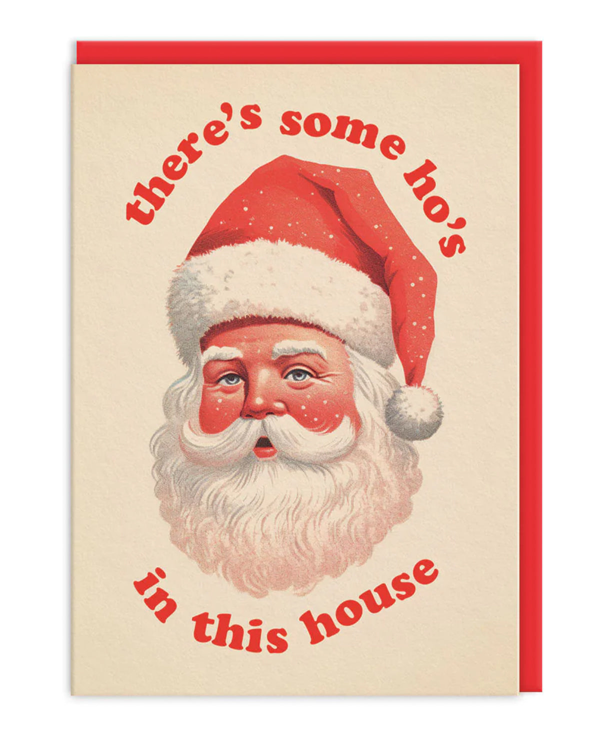 Retro-style Christmas card featuring a vintage Santa head wearing a red hat with the cheeky phrase “There’s some ho’s in this house” in bold red lettering. The card is A6 with a poppy red envelope, perfect for sending funny festive greetings. Sold by Rebel Romance, a small UK brand celebrating alternative style and humour for millennials.
