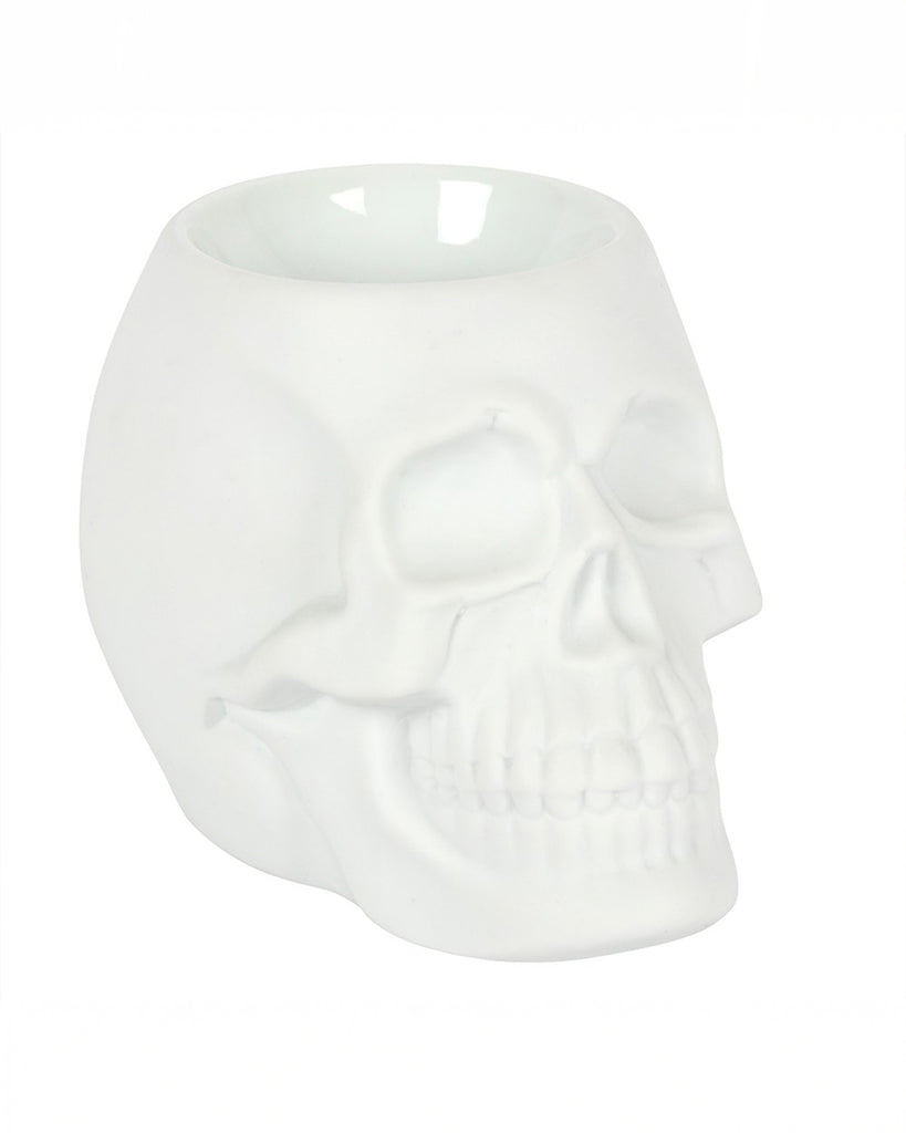 Side angle of the White Skull Oil Burner, showing its three-dimensional sculpting and smooth, matte ceramic finish. Ideal for Halloween and gothic home styling.