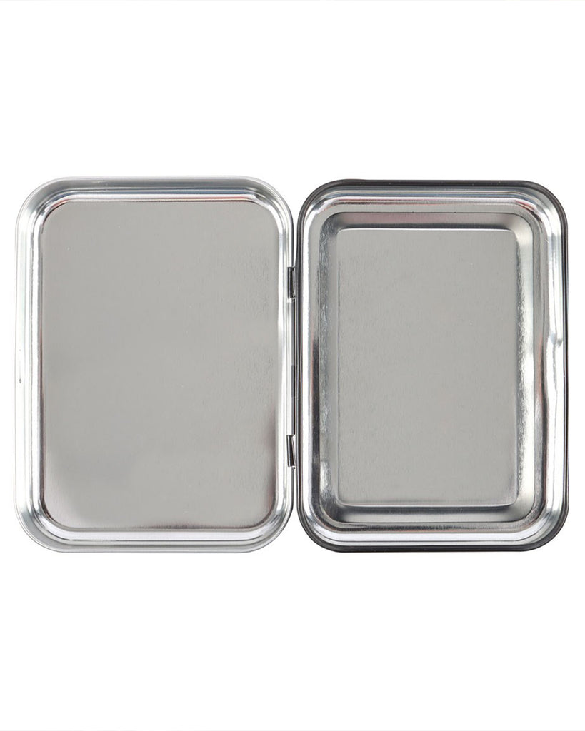 Inside view of the Smell the Flowers stash tin by Steven Rhodes. The hinged tin opens to reveal a smooth silver interior, perfect for storing herbs, rolling papers, or other small treasures.