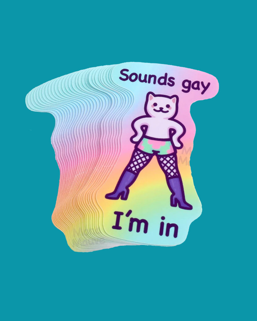 Stack of die cut rainbow vinyl stickers featuring a cartoon cat in fishnet tights, boots, and rainbow shorts, with the phrase “Sounds gay, I’m in.” A funny LGBTQIA+ pride sticker designed by Mona Mauve. Sold by Rebel Romance, a small UK business celebrating queer joy, inclusivity, and alternative humour.