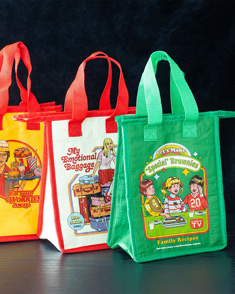 Three retro-style insulated lunch bags from Rebel Romance, a UK small business. Designs include “Eat Your Worries Away,” “My Emotional Baggage,” and “Let’s Make Special Brownies” by Steven Rhodes. Perfect quirky gifts for millennials who love alternative fashion and unique homeware.