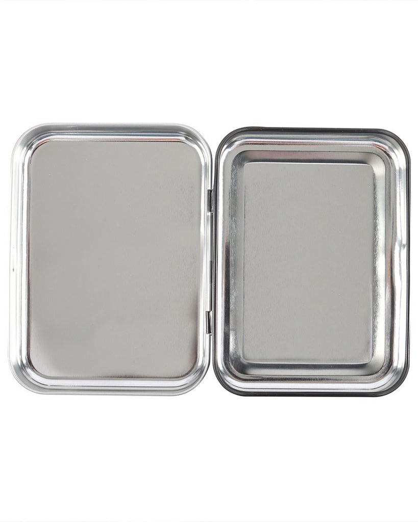 Inside view of the Rebel Romance “Let’s Make Special Brownies” Steven Rhodes stash tin. The silver metal interior has two sections when opened, perfect for safely storing herbs, sweets, or small essentials. A unique retro alternative homeware gift for millennials who love quirky humour and stylish storage.