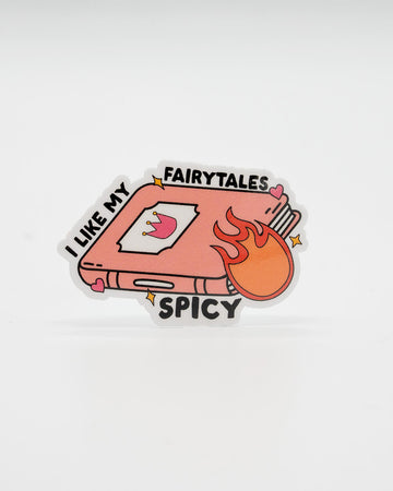 Cheeky die-cut vinyl sticker featuring a pink fairytale book with a crown on the cover, flames, sparkles, and the phrase “I Like My Fairytales Spicy.” A fun and flirty design perfect for spicy romance readers and fantasy fans. Created by Rebel Romance, a small UK brand celebrating alternative fashion, slow style, and bold, millennial-friendly bookish gifts.