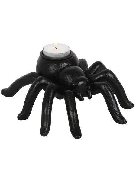  Black spider-shaped tealight holder with a white tealight candle inserted, showing a detailed eight-legged design on a plain white background.