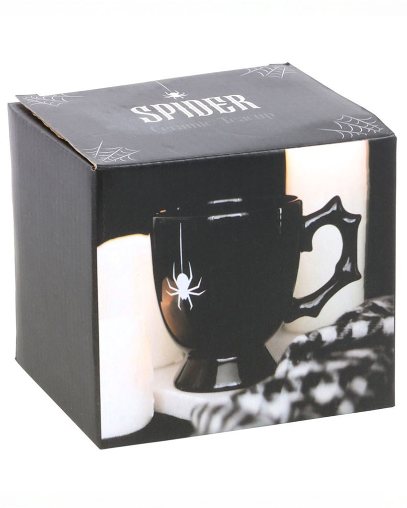Box packaging for the Black Spider Teacup featuring gothic design, spider graphics, and product photo.