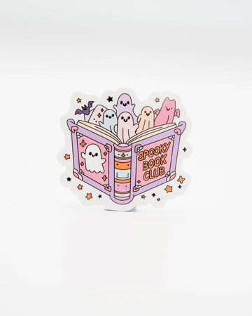 Cute die-cut vinyl sticker featuring pastel-coloured ghosts popping out of a pink and purple book labelled “Spooky Book Club,” surrounded by stars and sparkles. A fun Halloween-themed design perfect for readers and ghost lovers. Created by Rebel Romance, a small UK brand celebrating alternative fashion, spooky aesthetics, and quirky millennial-friendly gifts.