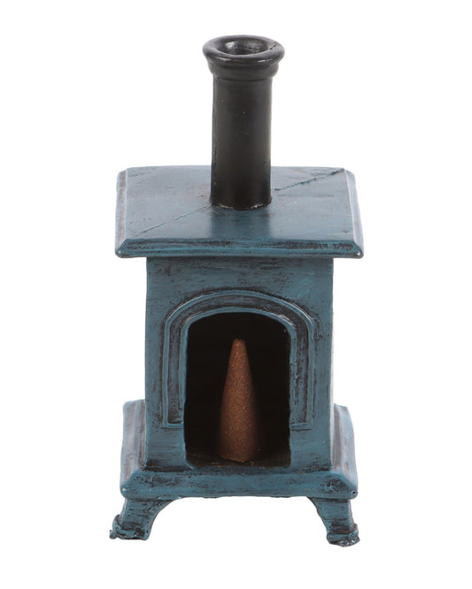 Rear view of the Rebel Romance stove-shaped incense burner with an incense cone inside the open cavity, ready to be lit. This vintage-style burner mimics a mini cast-iron wood stove.