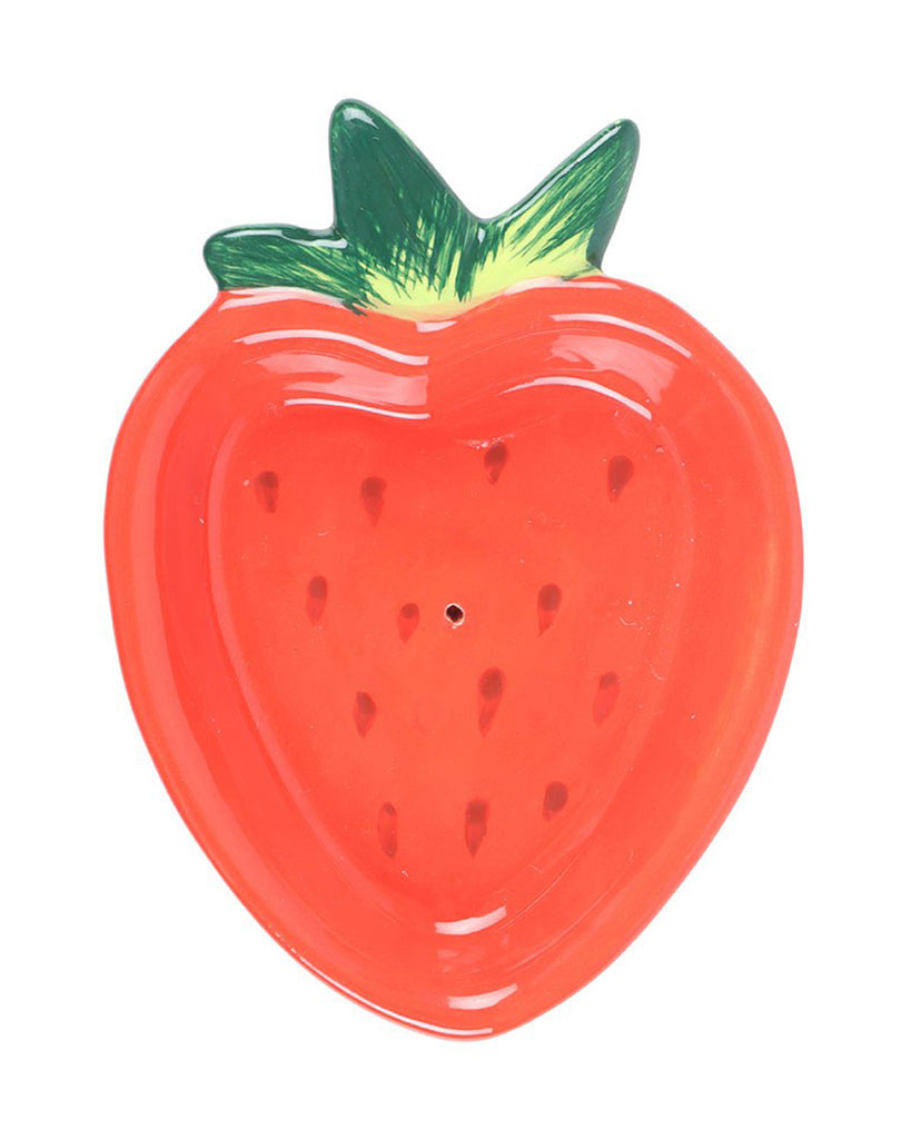 A top-down view of the strawberry-shaped incense holder, showcasing its realistic fruit details and the small hole for placing an incense stick.