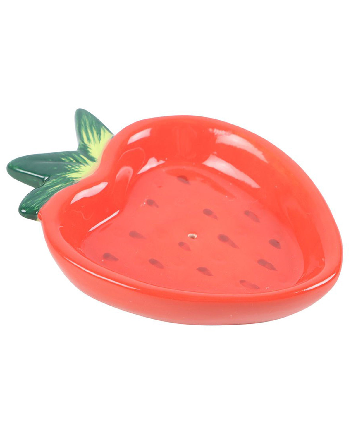 A vibrant ceramic strawberry incense stick holder with a glossy red finish, green leaves, and tiny seed details. The dish has a slightly curved shape and a central hole for holding incense sticks.