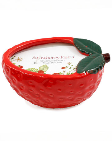 A vibrant, strawberry-shaped ceramic candlepot from Rebel Romance, filled with a Strawberry Fields fragranced candle. The red textured exterior mimics a real strawberry, while the top features green ceramic leaves for a cute, nature-inspired look. Once burned it can be used as a decorative strawberry tray.