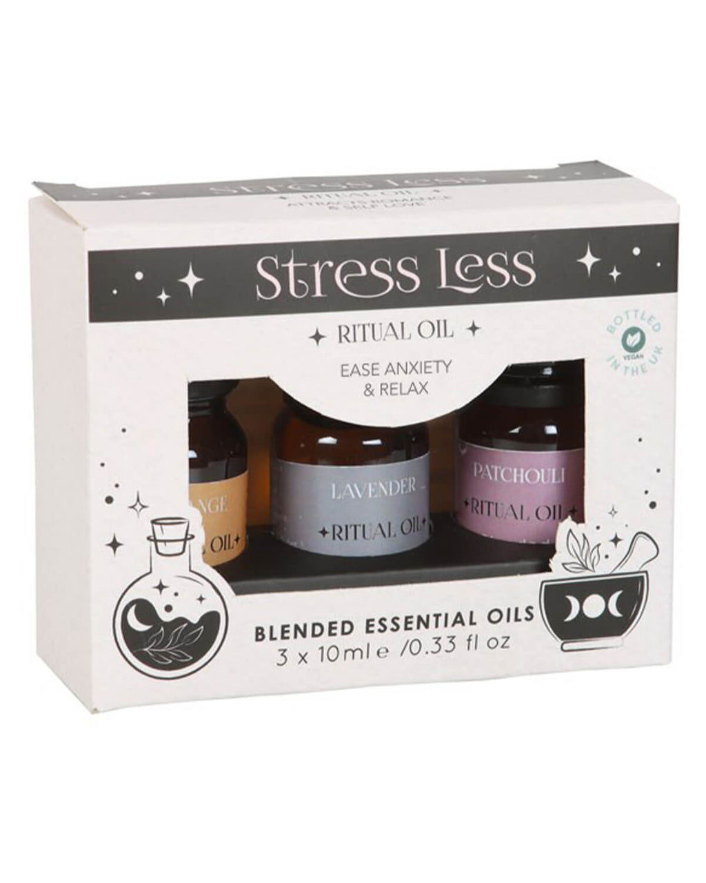 The front of the Stress Less Ritual Blended Essential Oils box, with celestial-themed design and ‘Ease Anxiety & Relax’ text visible.
