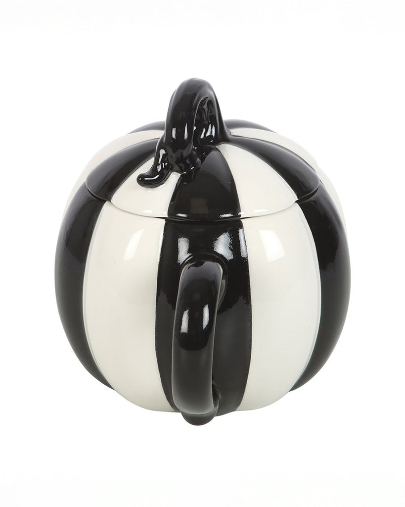 Back view of the Rebel Romance black and white striped pumpkin mug showing off its symmetrical ceramic handle and sculpted pumpkin form. A unique, gothic-inspired mug perfect for hot drinks and Halloween aesthetics.