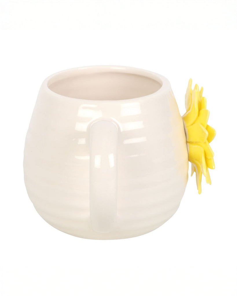 Back view of the Rebel Romance Hello Sunshine rounded ceramic mug, highlighting its smooth cream handle and a glimpse of the vibrant 3D sunflower detail on the front.