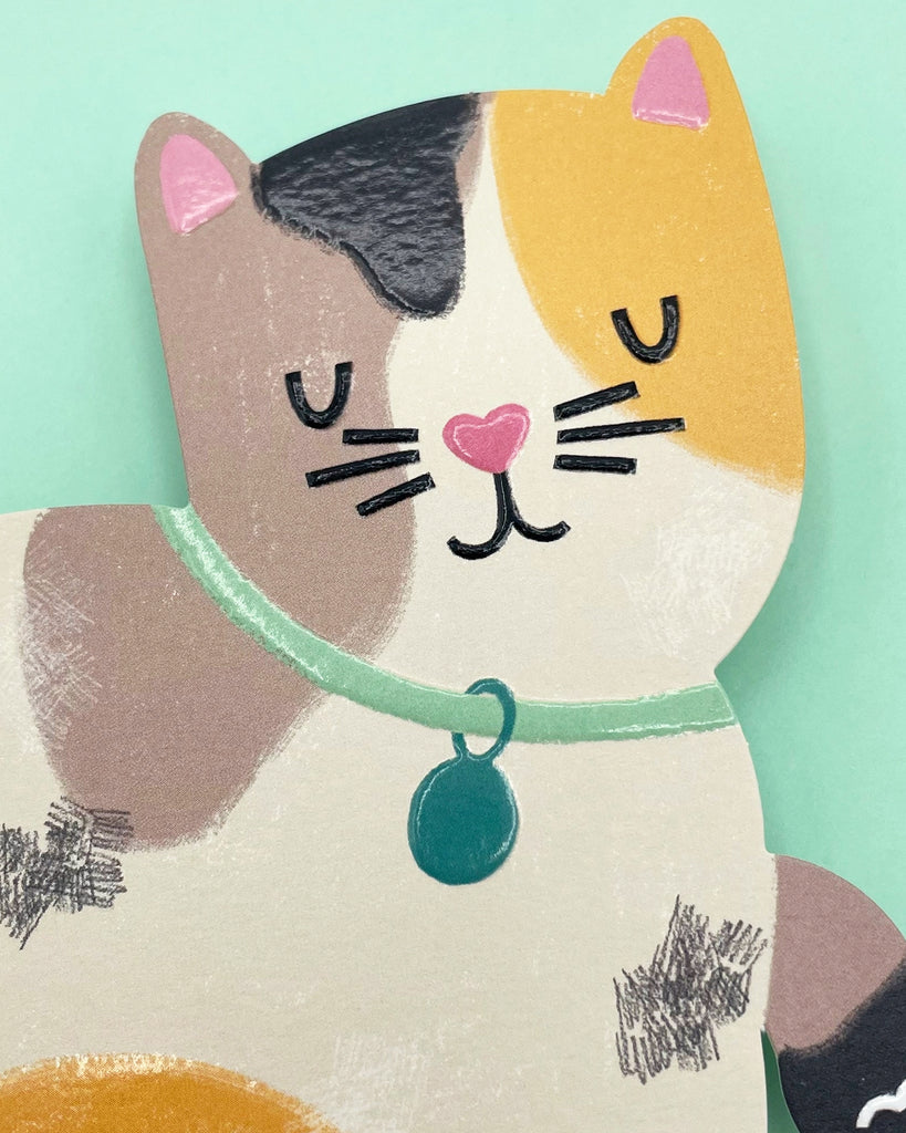 Adorable illustrated tabby cat card featuring a sweet feline design with luxe embossed details.
