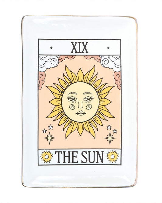 Front view of The Sun tarot ceramic trinket dish by Rebel Romance. A mystical sun motif with clouds and stars, edged in gold, making a unique alternative homeware gift for millennials.