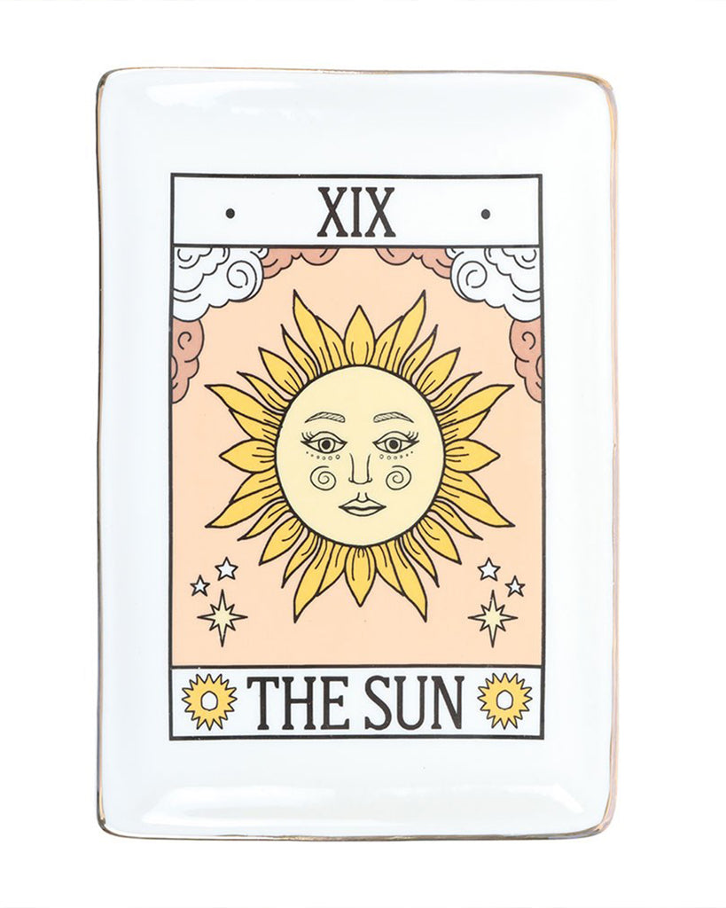 Front view of The Sun tarot ceramic trinket dish by Rebel Romance. A mystical sun motif with clouds and stars, edged in gold, making a unique alternative homeware gift for millennials.