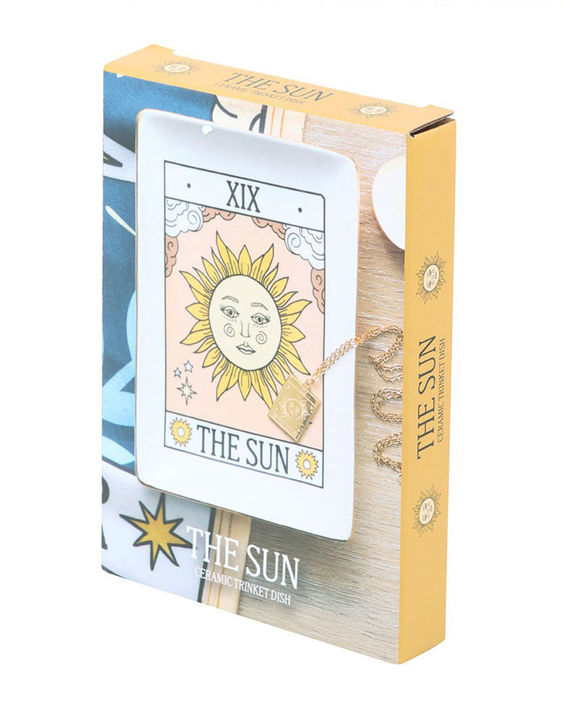 Rebel Romance The Sun tarot trinket dish displayed in its gift box packaging. A vintage‑inspired ceramic dish with gold detailing, ideal for storing jewellery, keys or keepsakes, perfect for alternative home décor.