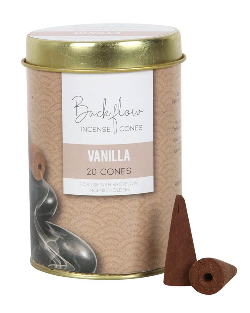 Front view of the Elements Vanilla Jumbo Backflow Incense Cones tin with a gold metal lid and brown textured label featuring ‘Vanilla’ and ‘20 cones’ in soft lettering, with two dark brown incense cones beside it.