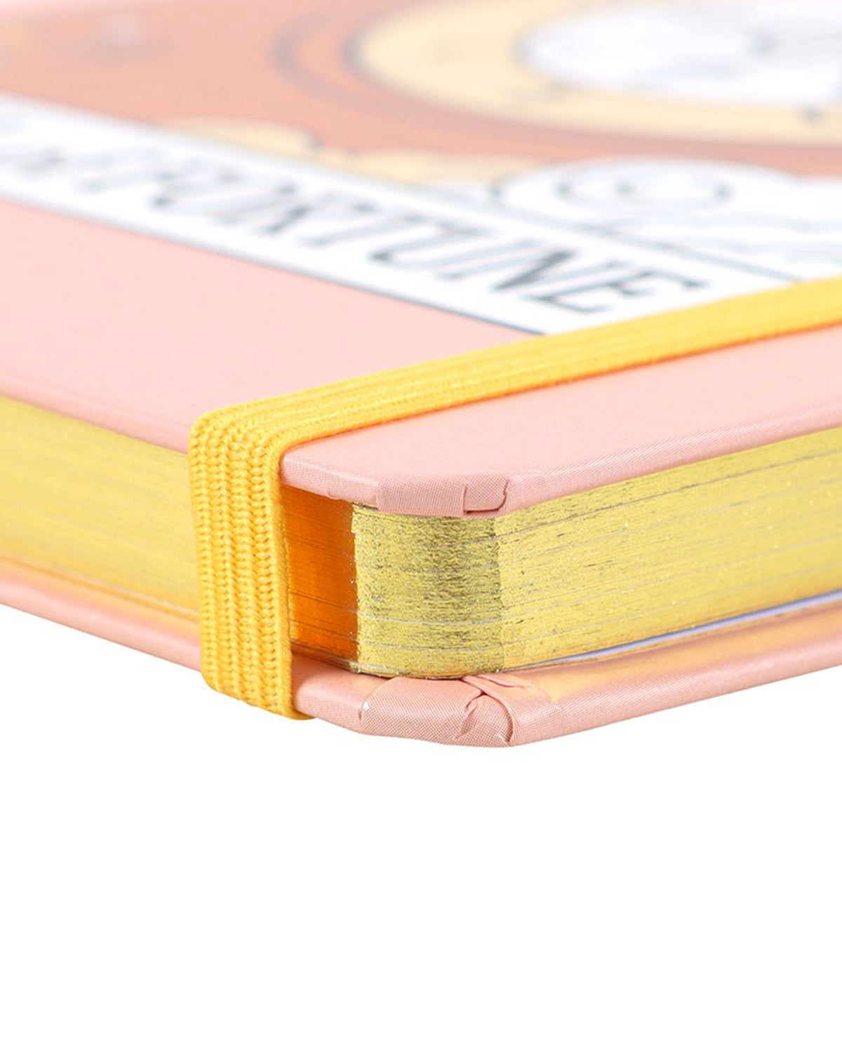 Close-up of a peach-pink vintage tarot notebook with a ‘Wheel of Fortune’ design. The gold-edged pages and yellow elastic strap are visible, ideal for journaling, tarot reading, or gifting.
