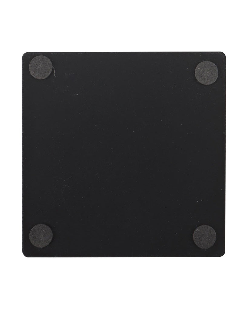 Back view of the Steven Rhodes Witches' Brew Black Magic coaster from Rebel Romance, showing plain black surface with four protective pads to keep your table safe.