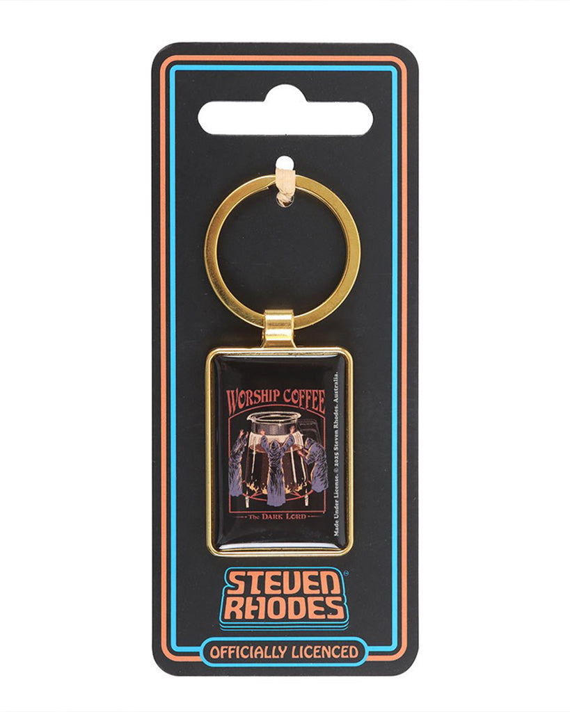 The Worship Coffee enamel keyring by Steven Rhodes, attached to a black display card with bold retro branding. Officially licensed design featuring coffee cult artwork. Available at Rebel Romance, a UK brand specialising in alternative fashion, quirky homeware, and unique gifts.