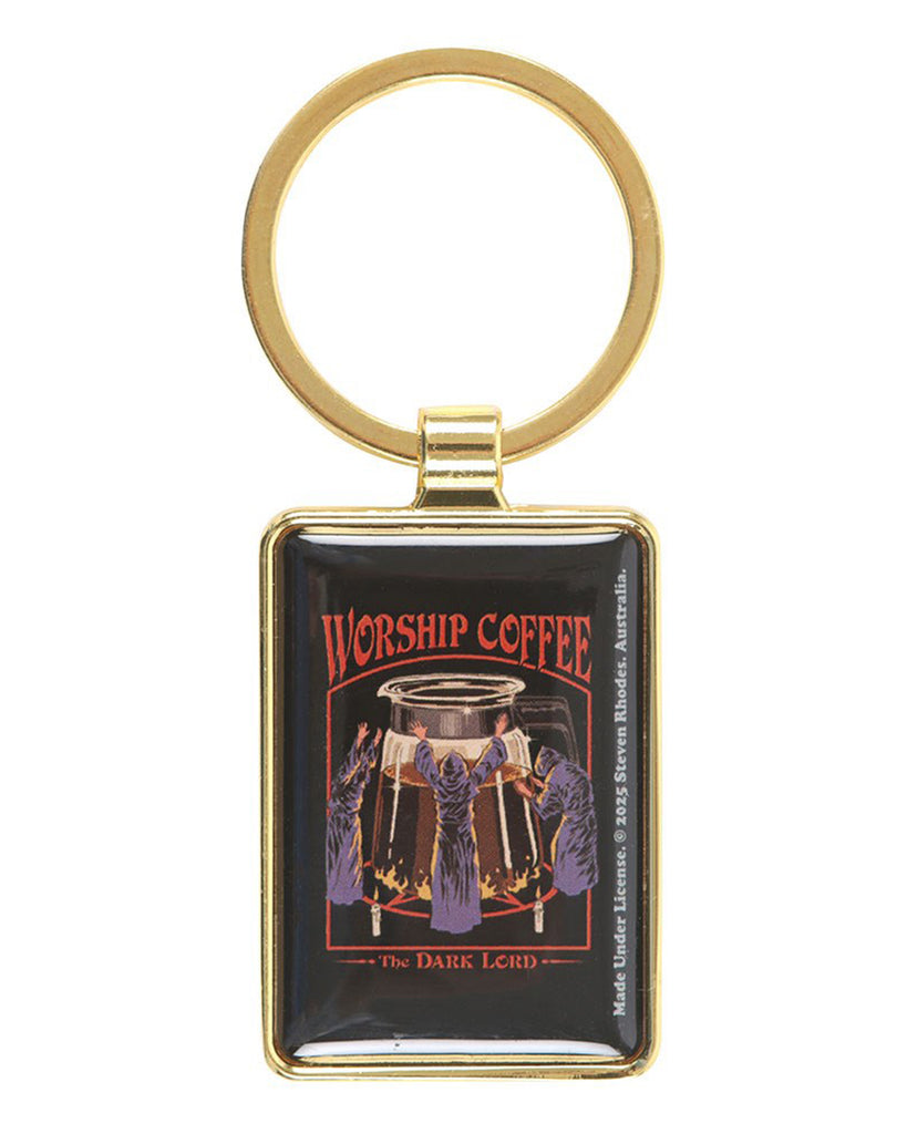 Front view of the Worship Coffee enamel keyring by Steven Rhodes, framed in gold metal. The design shows hooded figures worshipping a giant coffee pot with text above: “Worship Coffee – The Dark Lord.” Stocked by Rebel Romance, a UK alternative fashion and lifestyle store.