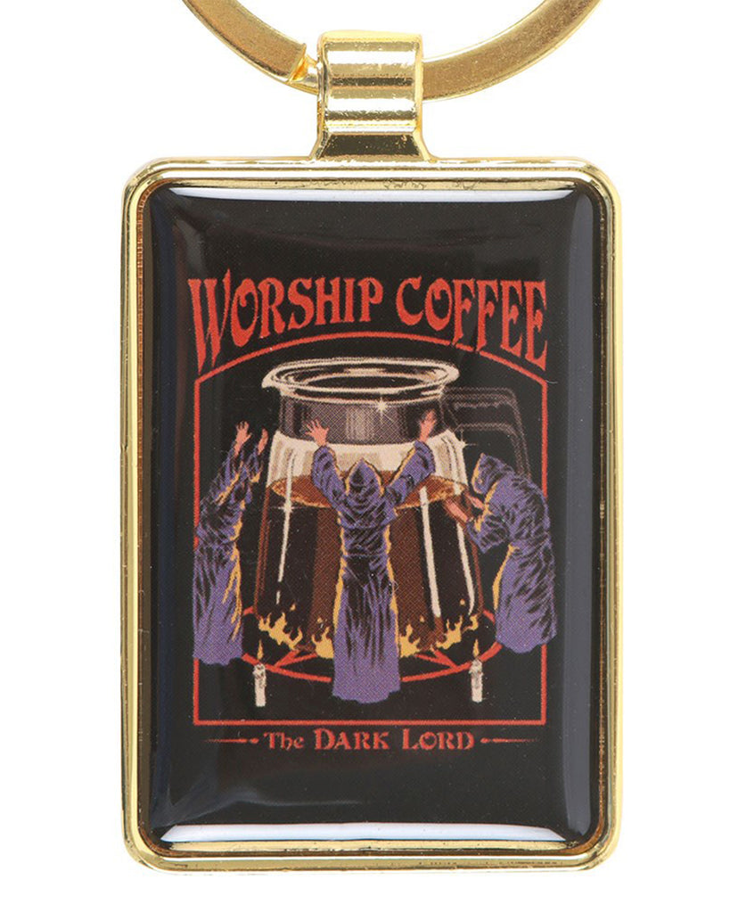 Rectangular enamel keyring with a gold frame featuring Steven Rhodes’ retro gothic design. The artwork shows robed figures worshipping a giant coffee pot, with text reading “Worship Coffee – The Dark Lord.” Available at Rebel Romance, a UK brand celebrating alternative fashion, gifts, and quirky homeware.
